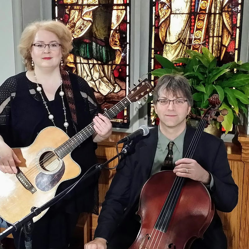 Felicia Meyer with guitar and David Meyer with cello